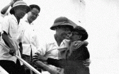 Le Duan Embraces Son Sen, 1975