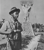 Guerilla stands guard in liberated Kratie